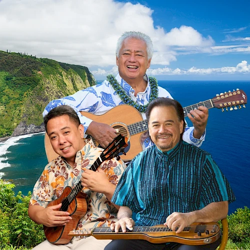 Three men are playing musical instruments against a scenic coastal backdrop with lush greenery and ocean views.